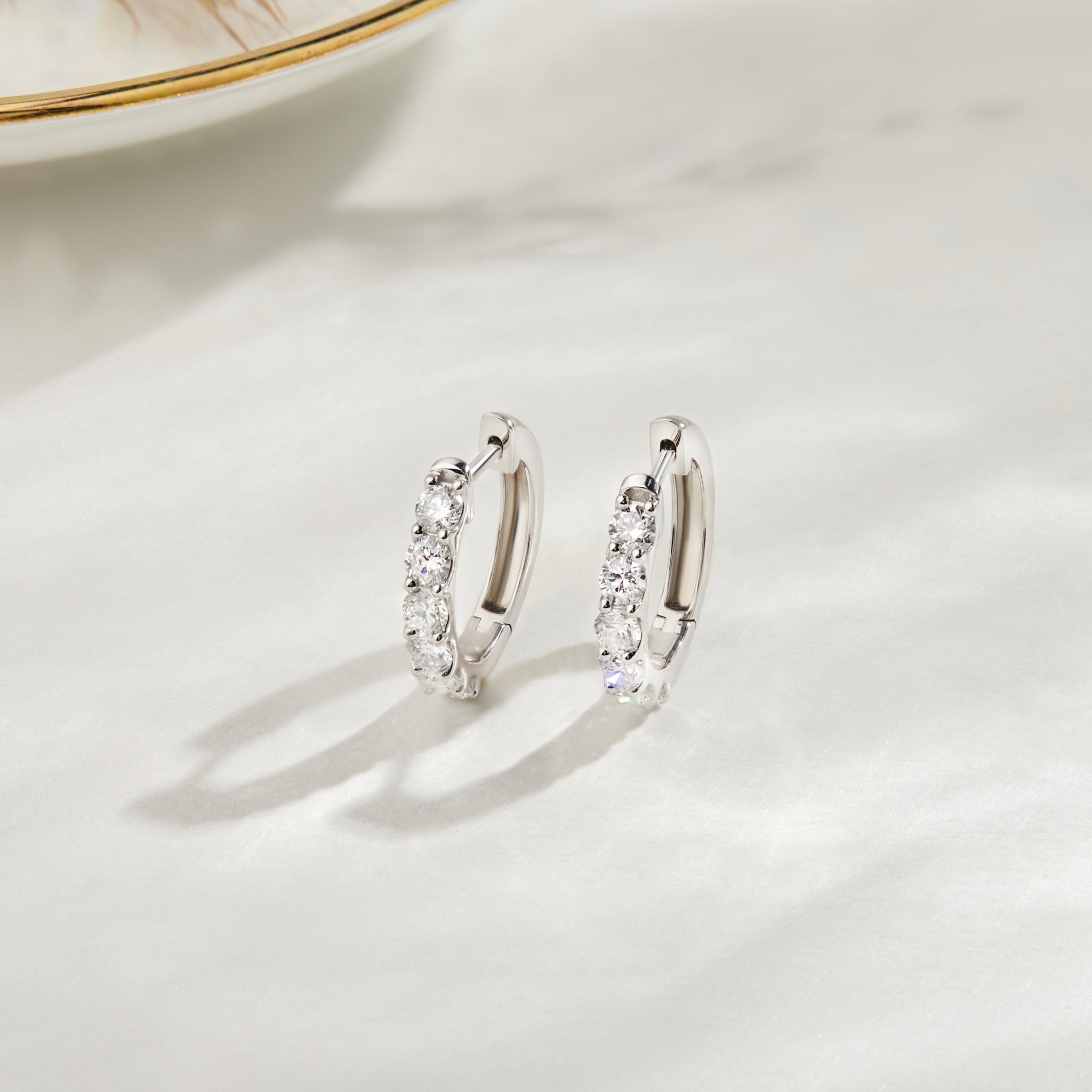 Lab Grown Diamond Shared Prong Set Huggie Hoop Earrings in Sterling Silver | 1.47 CT