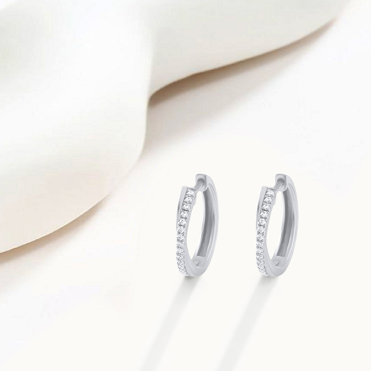 Lab Diamond Twisted Huggie Hoop Earrings in Sterling Silver | 0.24 CT