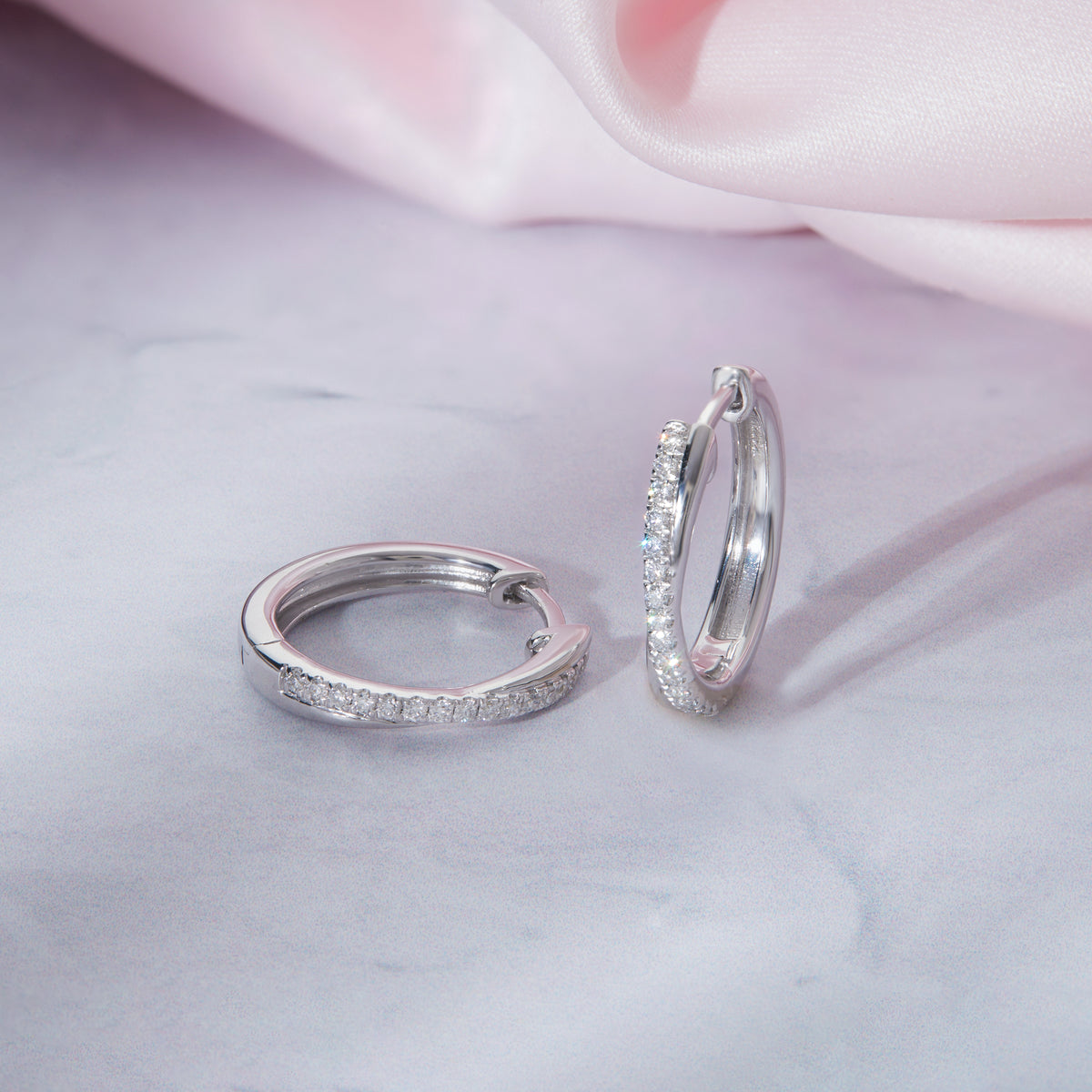 Lab Diamond Twisted Huggie Hoop Earrings in Sterling Silver | 0.24 CT