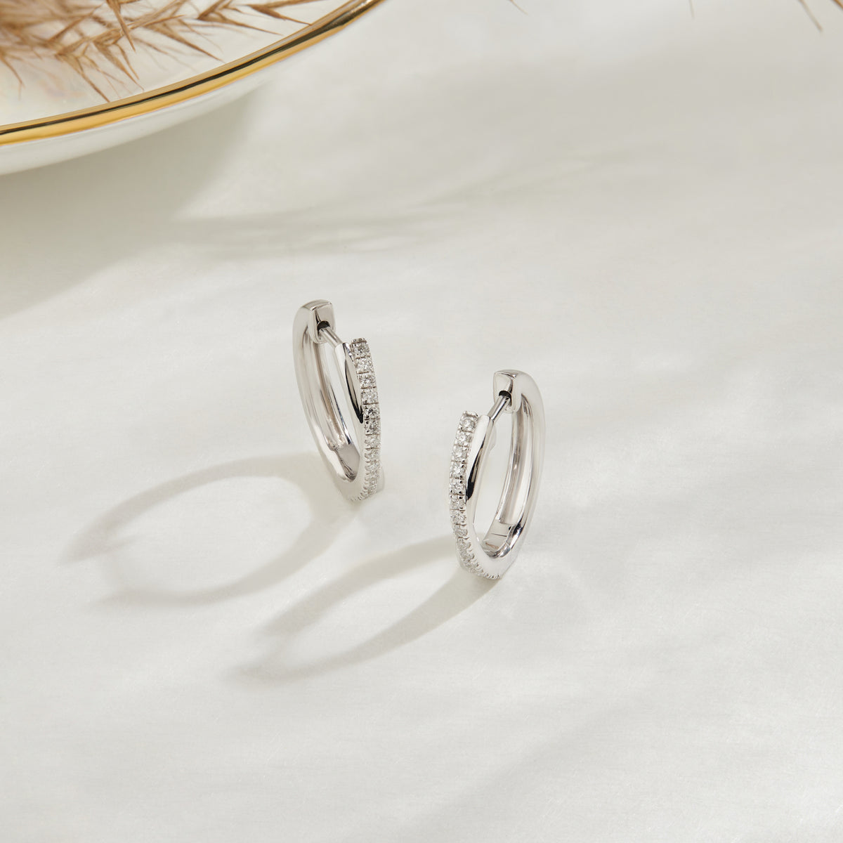 Lab Diamond Twisted Huggie Hoop Earrings in Sterling Silver | 0.24 CT