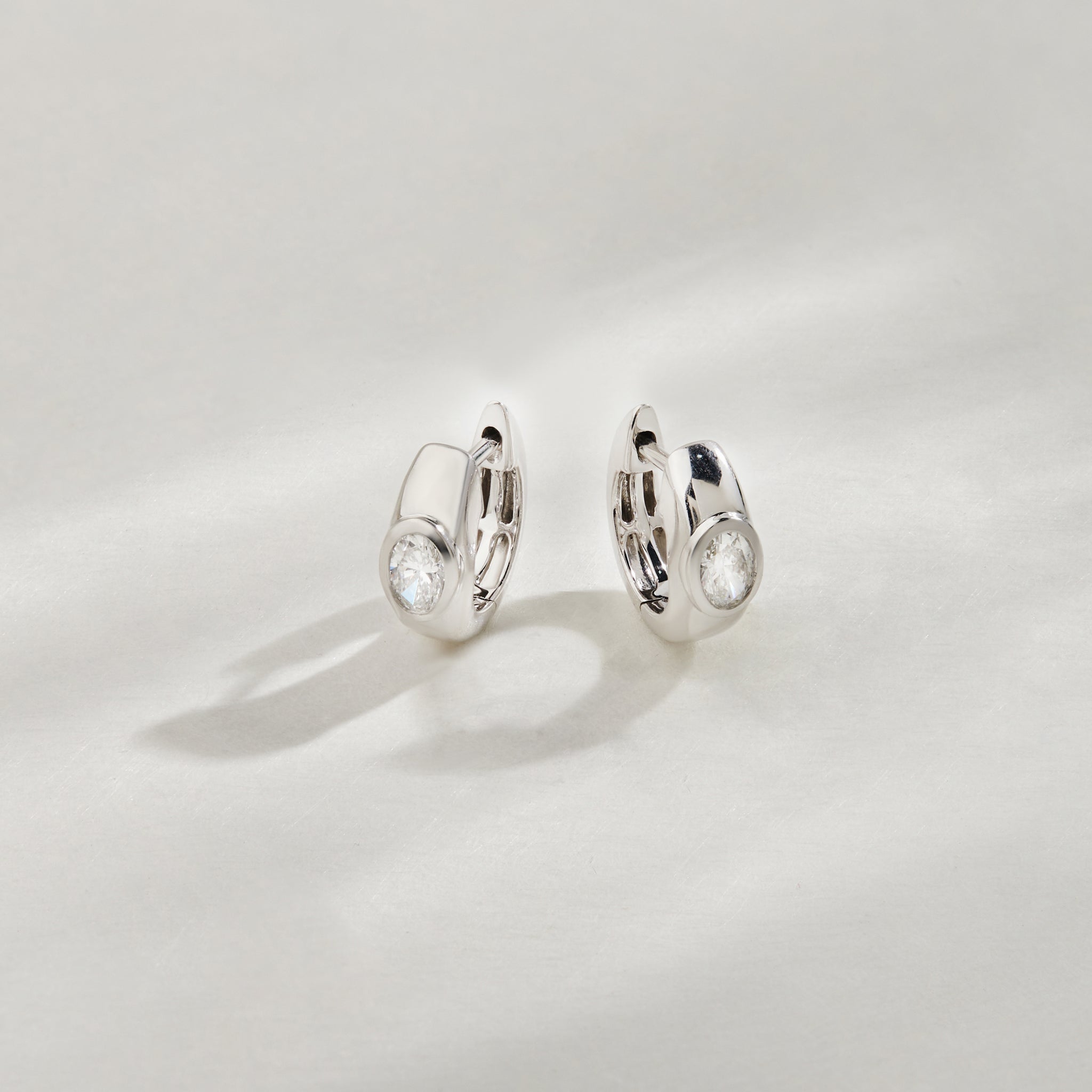 1/2 Ct Oval Cut Lab Grown Diamond Huggie Hoop Earrings 925 Silver